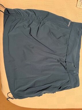 Columbia women's Teal Performance Athletic Skort. Medium